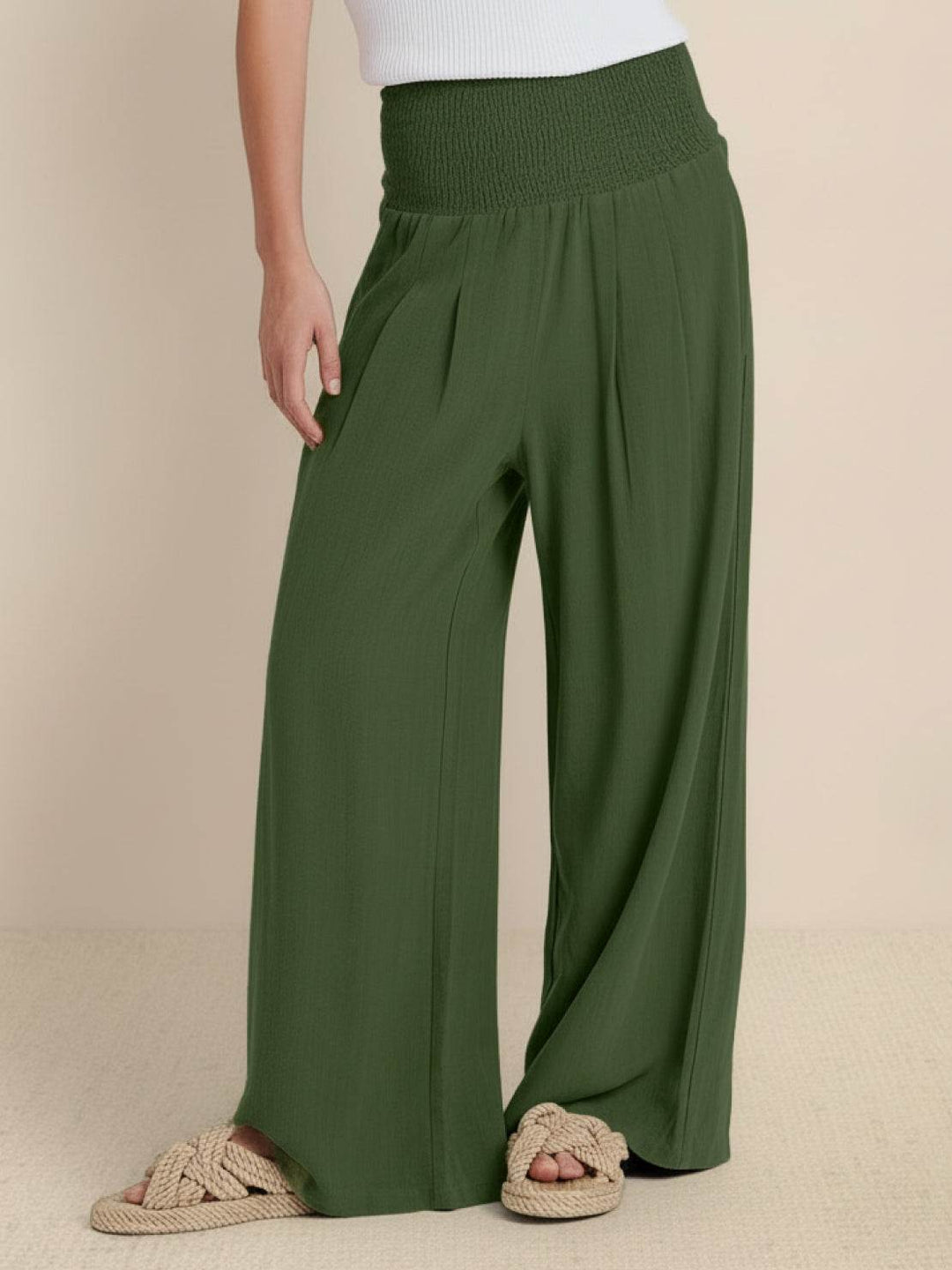 Spring style women's smocked waist wide leg trousers, relaxed fit for comfort and versatile looks.