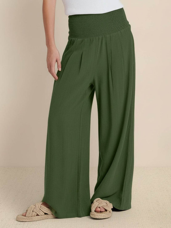 Spring style women's smocked waist wide leg trousers, relaxed fit for comfort and versatile looks.