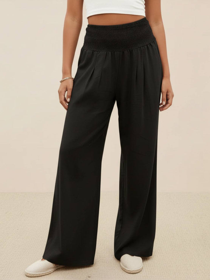 Women's relaxed fit high waist wide leg trousers, perfect for everyday elegance and comfort.