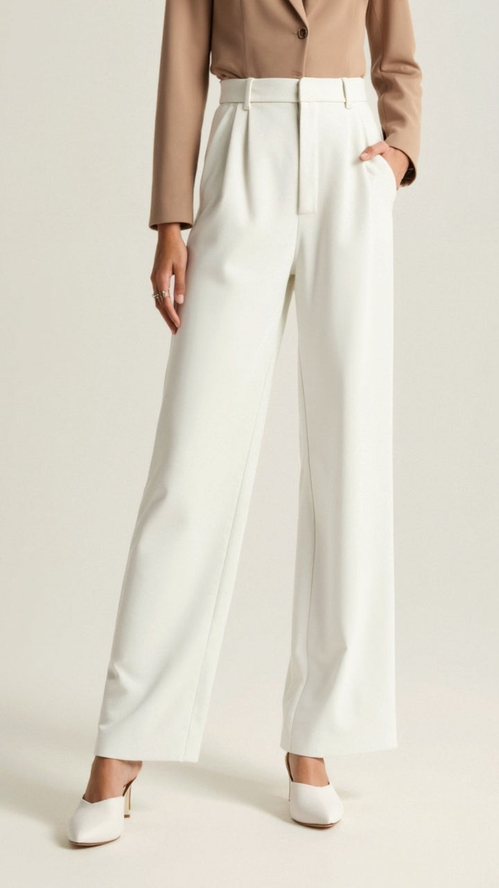 Model posing in high-waist wide-leg spring pants, showcasing their flattering cut and modern appeal.
