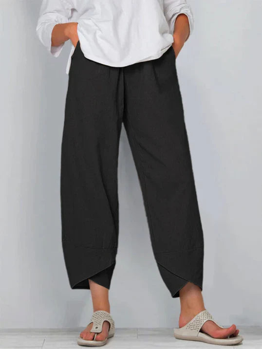 High-waist wide leg women's pants with tulip hem, a versatile summer fashion piece.
