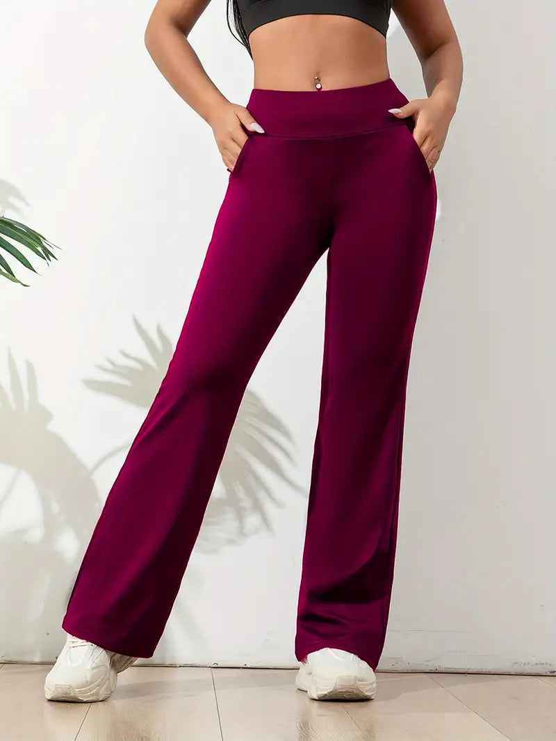 Stylish women's flared high-waist athletic pants, providing ultimate comfort & flexibility for any activity.