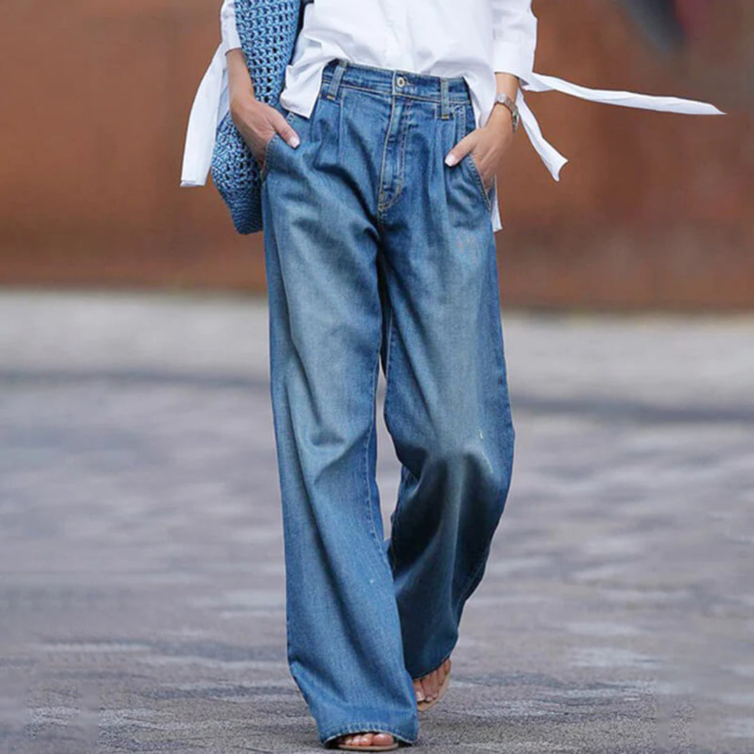 Women's high-waisted pleated wide-leg denim jeans, a comfortable and fashionable casual pants option.