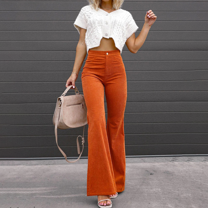 Women's high-waisted ribbed flared pants, retro-inspired and flattering for versatile fashion.