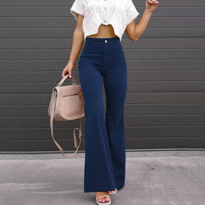 Casual yet stylish women's ribbed flared pants, high-waisted fit for a modern retro look.