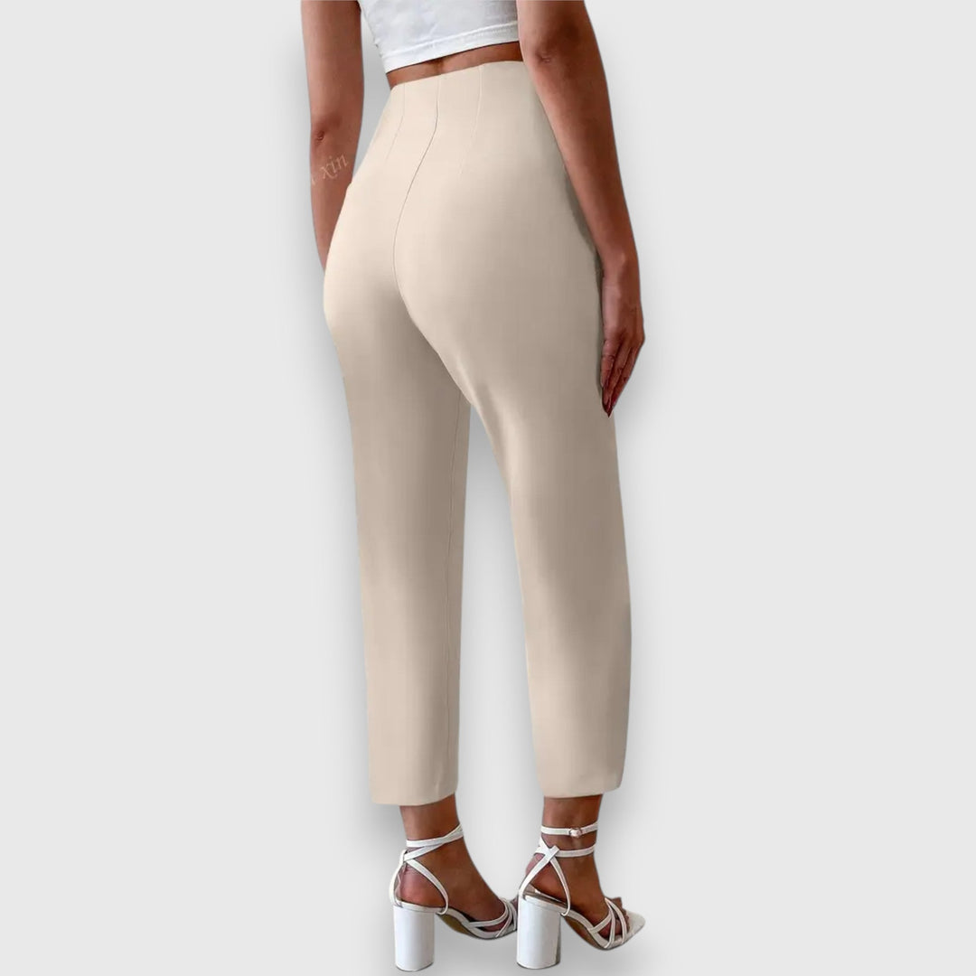 Chic women's high-waisted straight leg tailored pants, versatile for workwear or elegant business casual outfits.