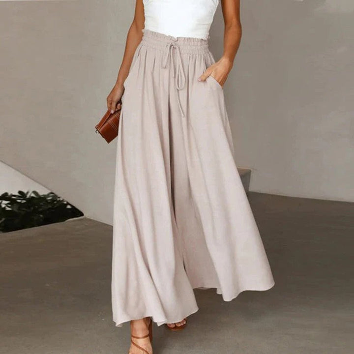 Flowing wide leg palazzo pants for women, high waisted for a flattering, comfortable fit.