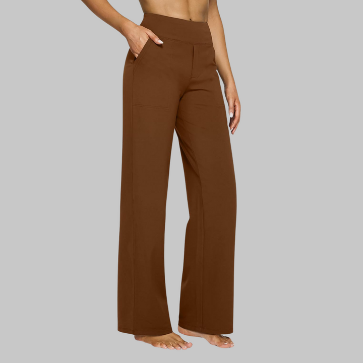 Flowy wide-leg women's pants, high-waisted for a flattering fit, includes convenient side pockets.