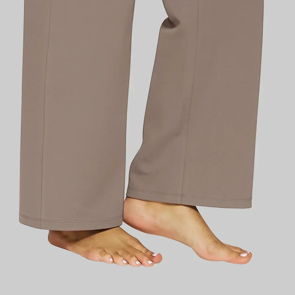 Stylish women's high-waisted wide-leg pants, perfect everyday fashion with handy side pockets.