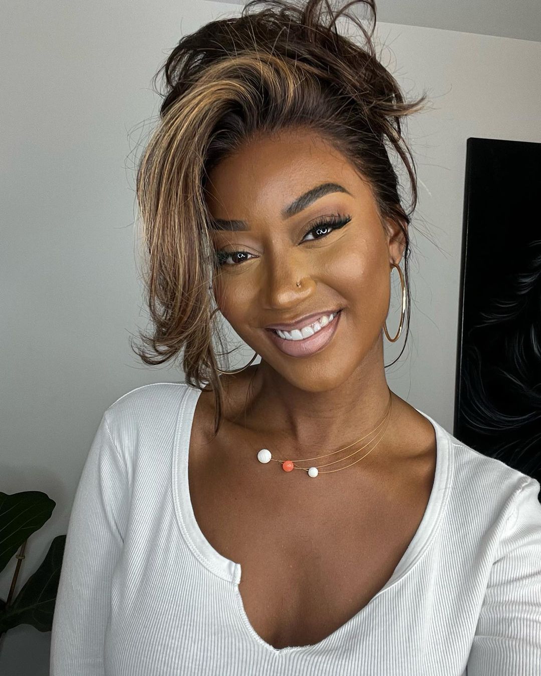 Natural wave lace front wig for women. Highlighted dark brown & blonde human hair. Ready-to-wear style.