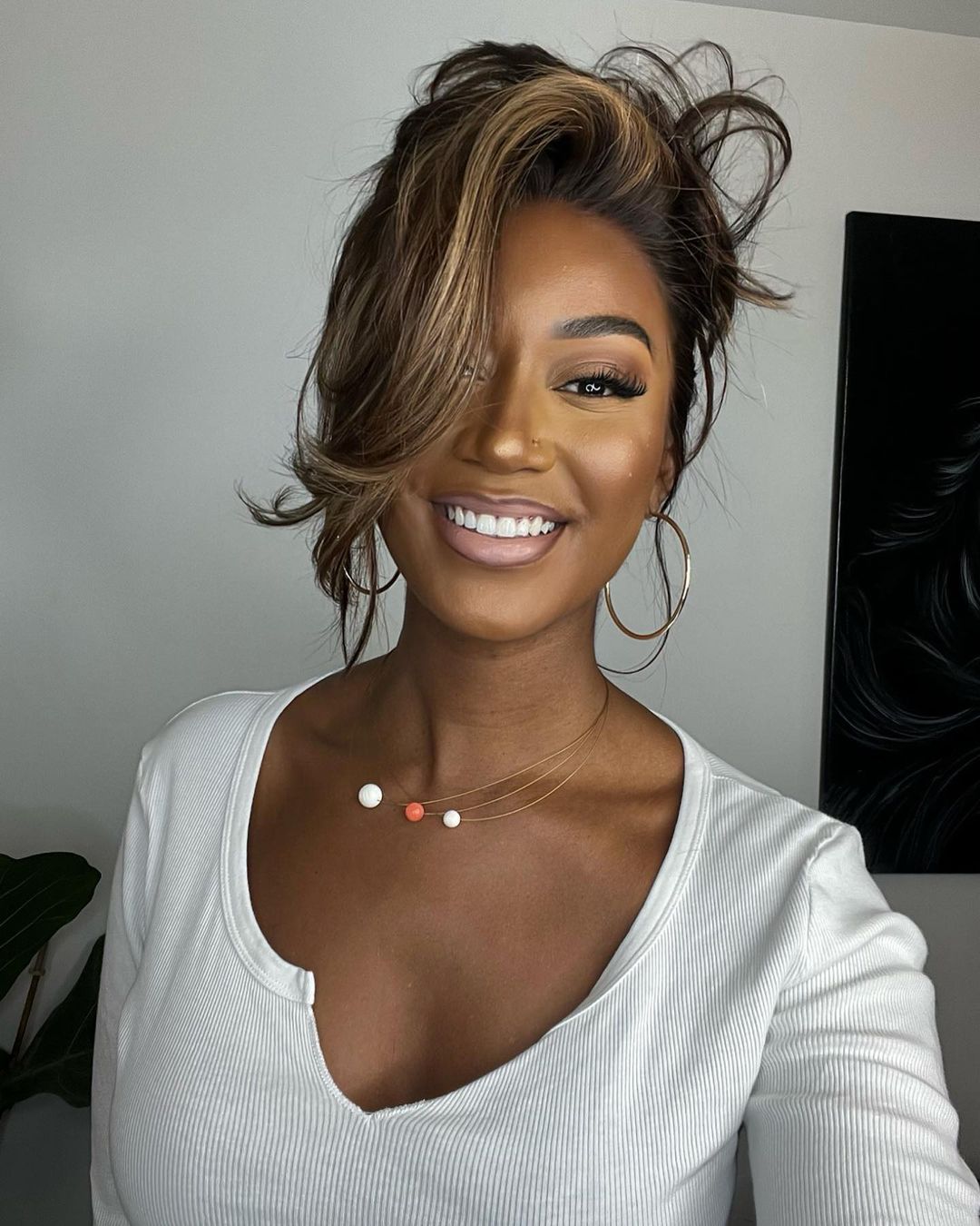 Glamorous women's natural wave lace front wig. Virgin human hair with dark brown & blonde highlights.
