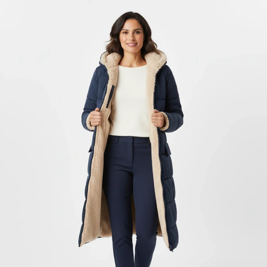 Oversized women's insulated puffer jacket, cozy and warm for cold winter days.