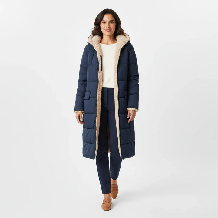 Women's long puffer jacket with hood, ideal for cold weather and stylish warmth.