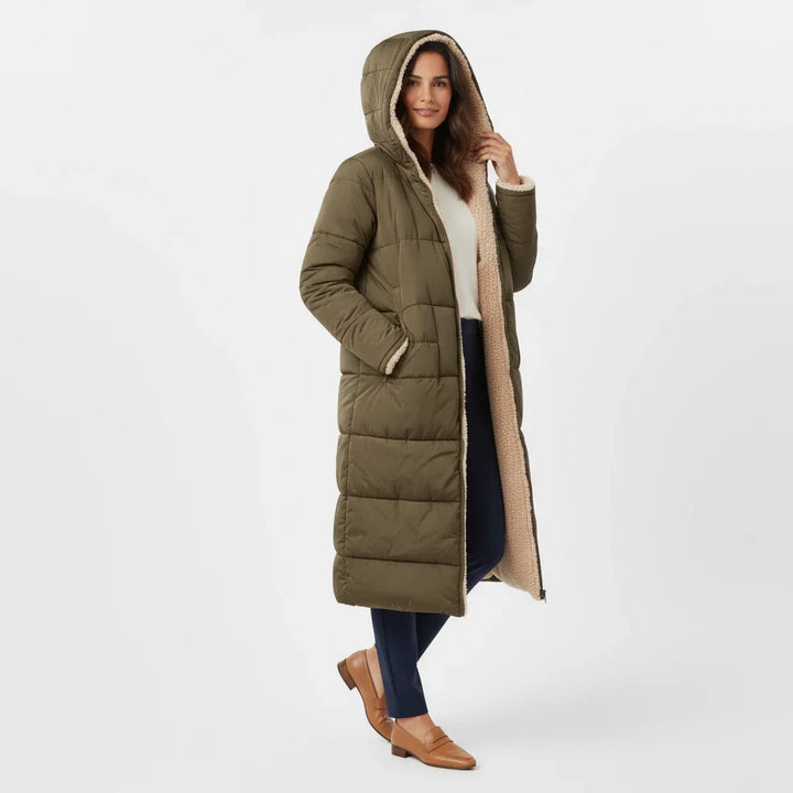 Warm women's puffer coat, insulated and hooded for ultimate winter protection.