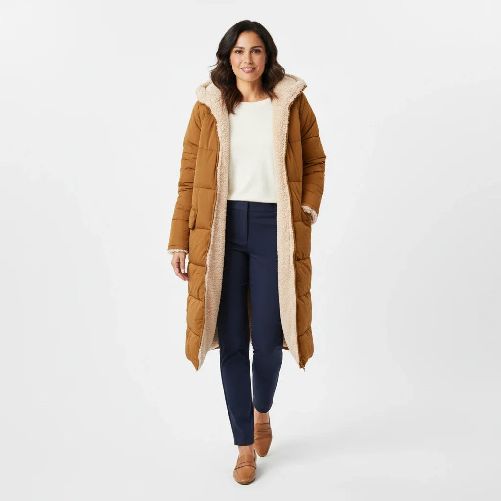 Stylish women's quilted puffer jacket with hood, perfect for winter fashion.