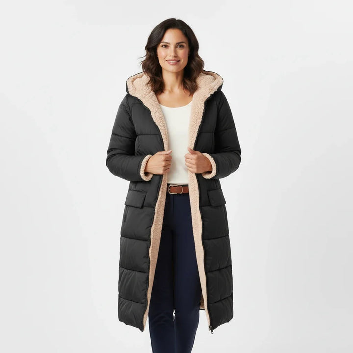 Insulated long puffer jacket for women, ideal for winter style & warmth.
