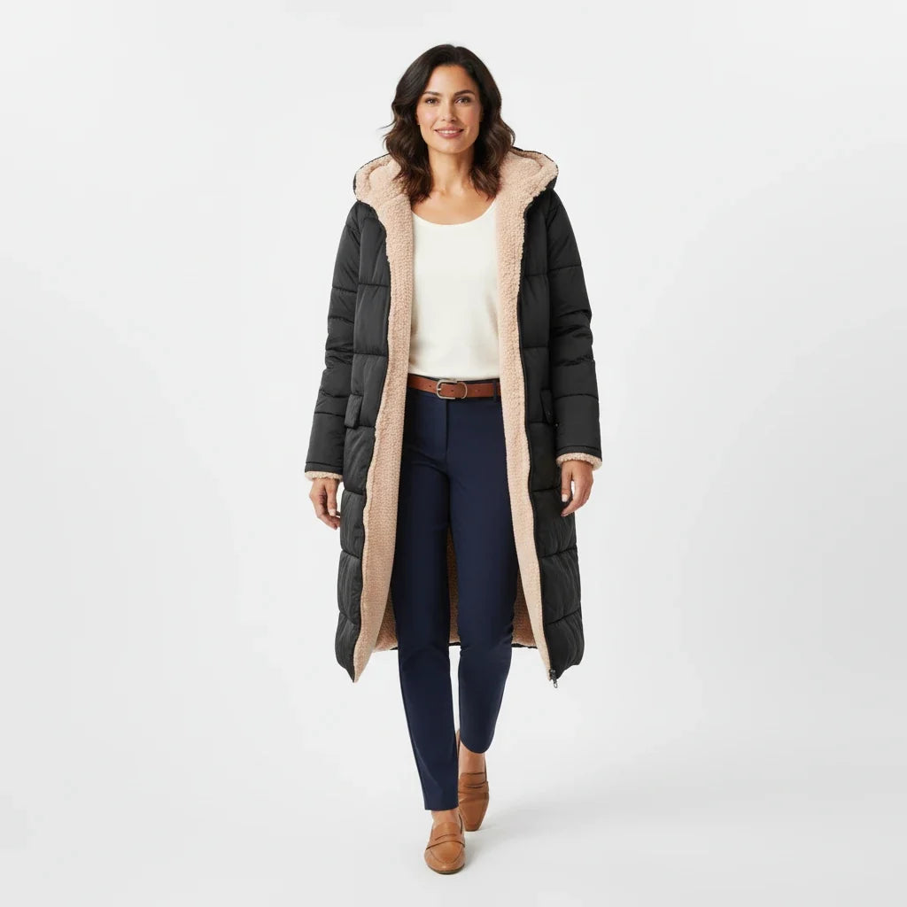 Cozy women's hooded puffer, a stylish quilted jacket for cold weather fashion.