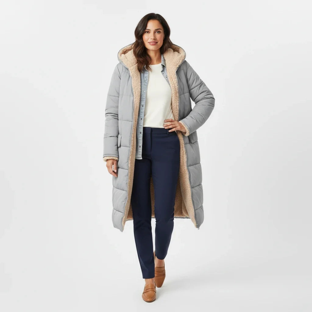 Quilted women's puffer jacket, warm and cozy with a hood for cold weather.
