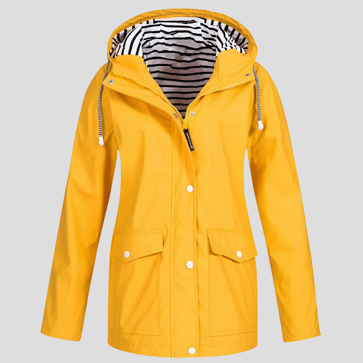 Women's hooded waterproof jacket, ideal for rain, with front pockets. Lightweight & versatile for outdoor wear.