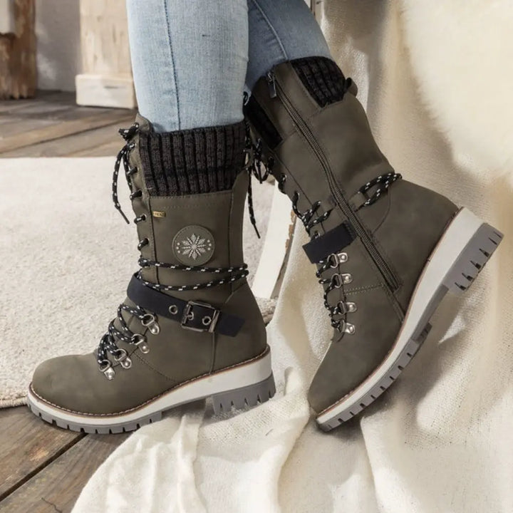 Pair of women's winter boots, insulated and waterproof, ready for snow
