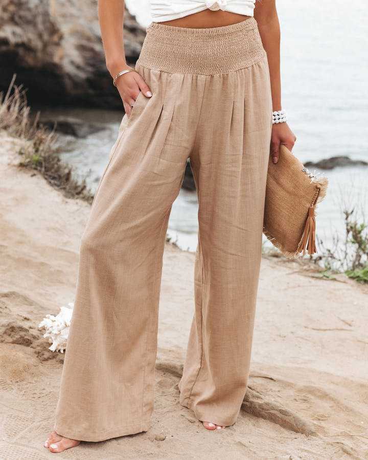 Women's Kaia wide leg beach trousers, perfect for summer resort wear, featuring an elastic waist and relaxed fit.