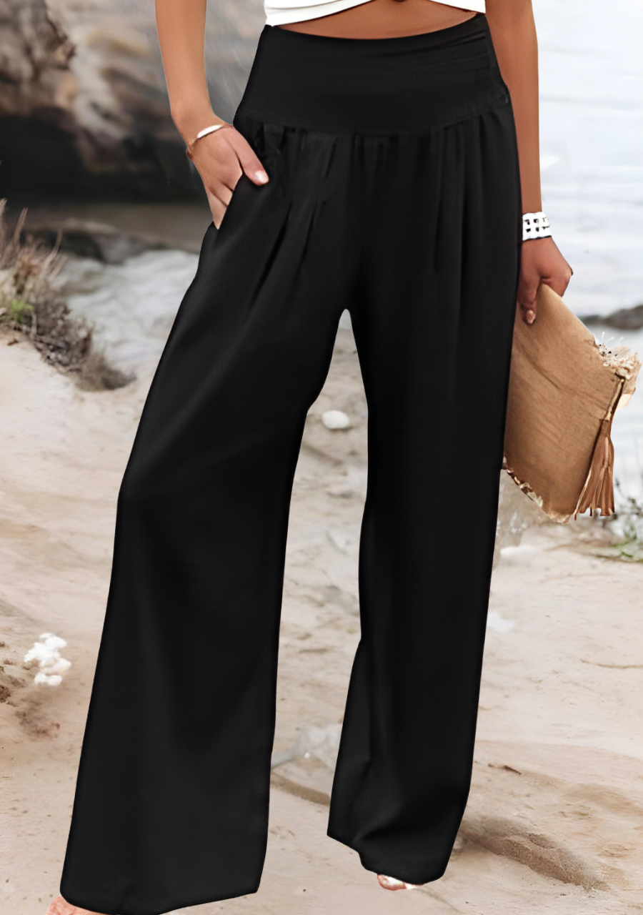 Flowing women's wide leg pants, ideal for summer vacation outfits & loungewear; comfy and chic beach trousers.