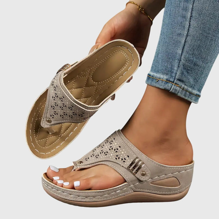 Slip-on orthopedic wedge sandals for women, designed for comfort, stability, and everyday arch support.