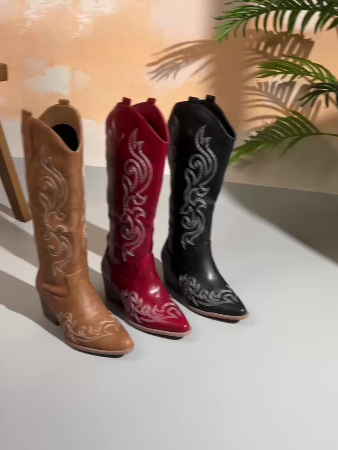 Western-inspired knee-high boots for women, featuring a stylish block heel.