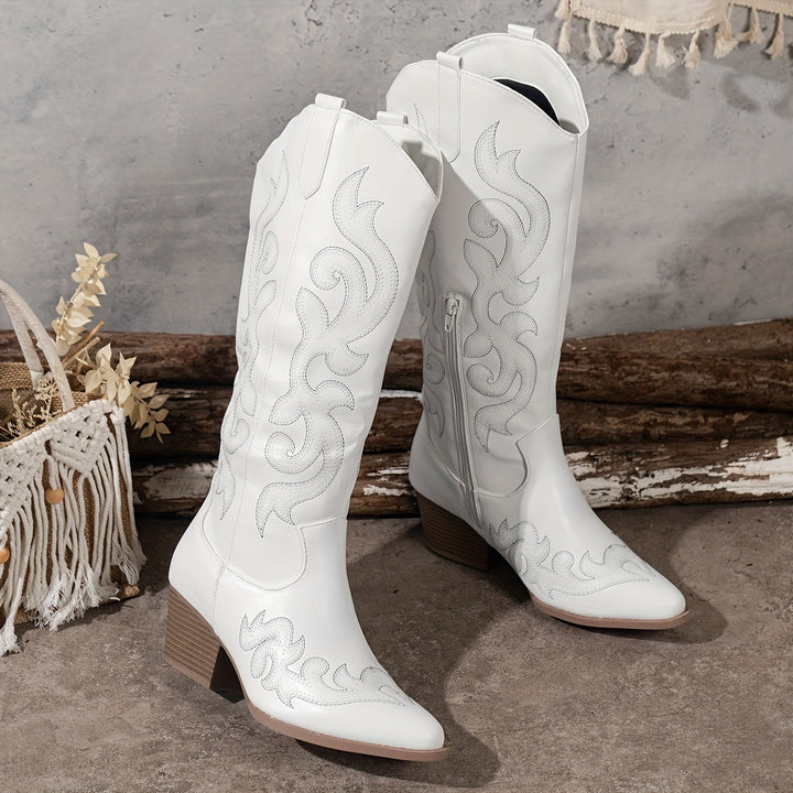 Modern women's knee-high cowboy boots, pointed toe and sturdy block heel.