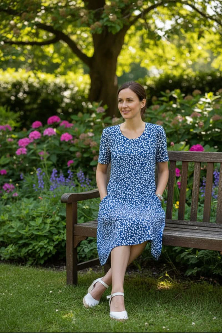 Women's polka dot knee-length dress. Pullover casual A-line, ideal for versatile summer outfits.