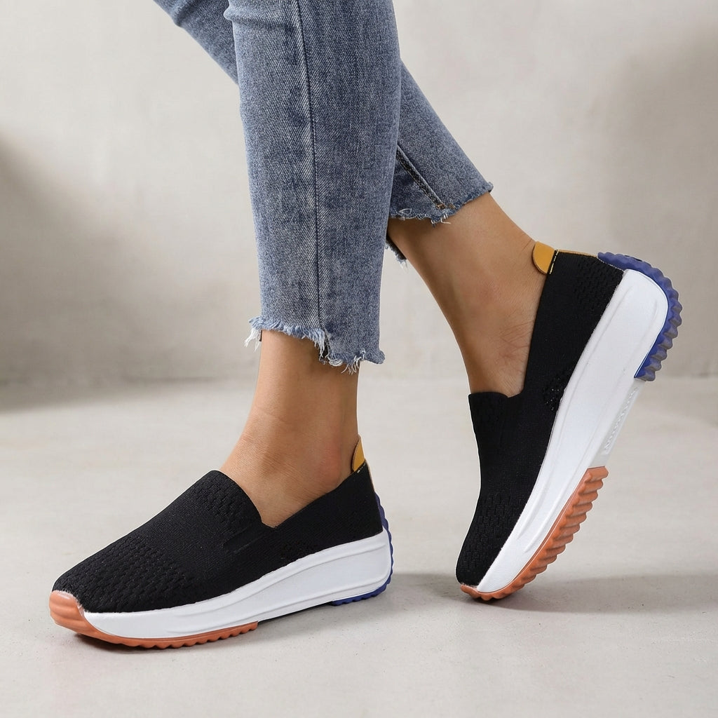 Women's knit slip-on platform sneakers, offering orthopedic support and comfort for everyday walking.