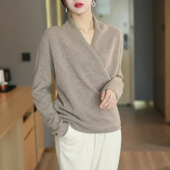 Stylish women's apparel: long sleeve knit top with a trendy wrap neck, spring essential