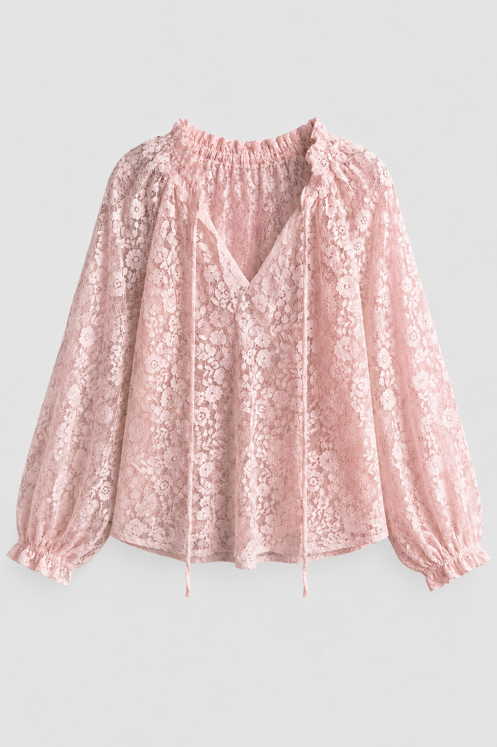 Women's lace detail blouse with a tied neckline, long sleeves, ideal for casual or semi-formal wear.