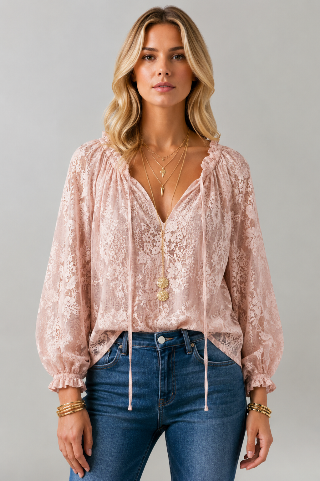 Versatile white lace blouse with tied neckline, long sleeve, perfect for casual and semi-formal looks.