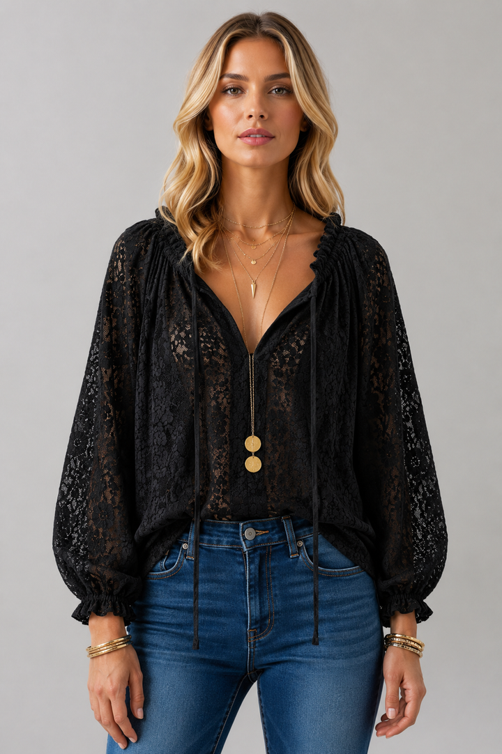Loose fit beige women's lace top with a delicate tied neckline and comfortable long sleeves.