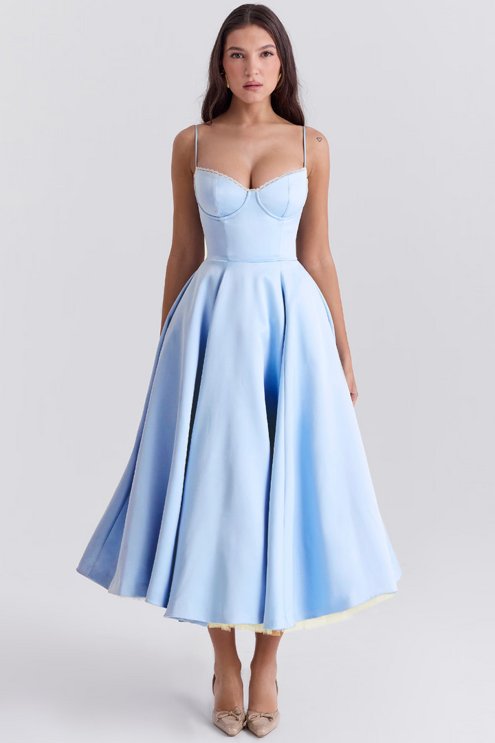 Women's lace-trim midi dress with corset bodice, sweetheart neckline, and convenient pockets. Elegant occasion wear.