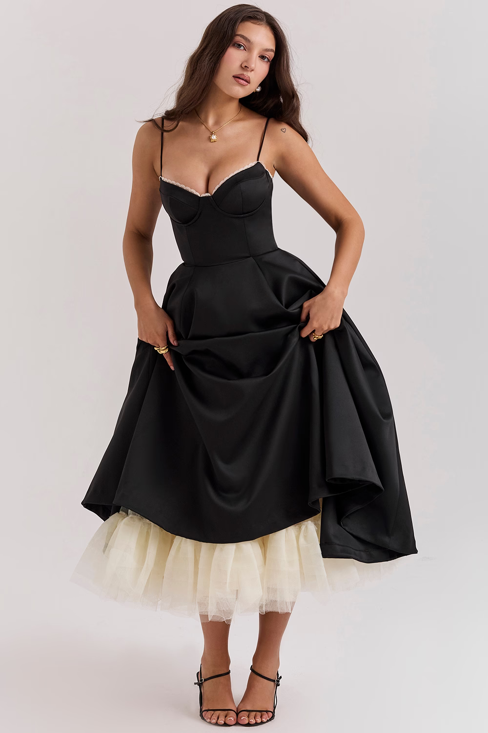 Party-ready women's midi dress with a lace-trim corset bodice, sweetheart neckline, and handy pockets. Elegant and chic.