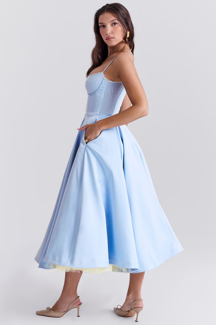 Elegant women's lace-trim midi dress with corset bodice, sweetheart neckline, and delicate tulle accents. Sleeveless party dress.