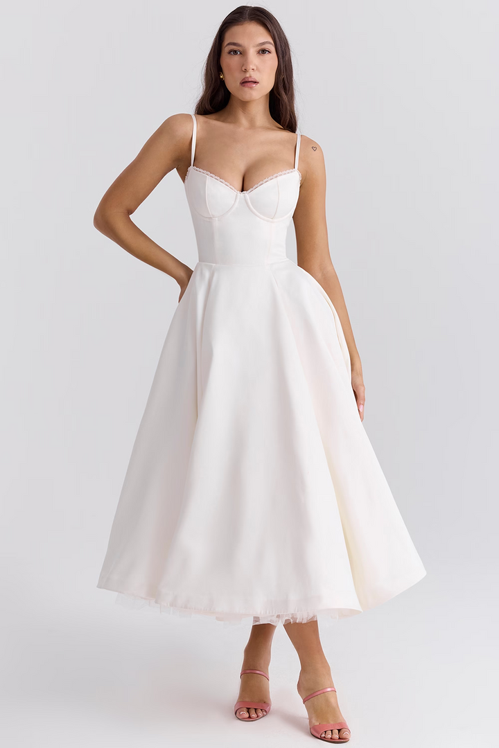 Flattering elegant women's midi dress with a corset bodice, lace trim, and practical pockets. Sweetheart neckline party wear.