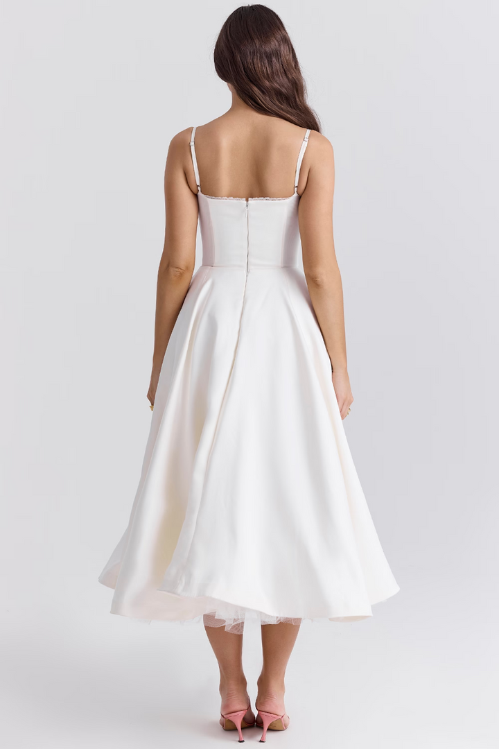 Lace-trim midi dress for women, with a corset bodice, tulle accent, and practical pockets. Elegant sleeveless party dress.