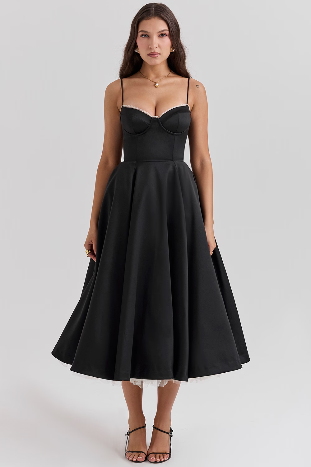 Feminine women's lace midi dress with a flattering corset bodice, sweetheart neckline, and convenient pockets. Occasion wear.