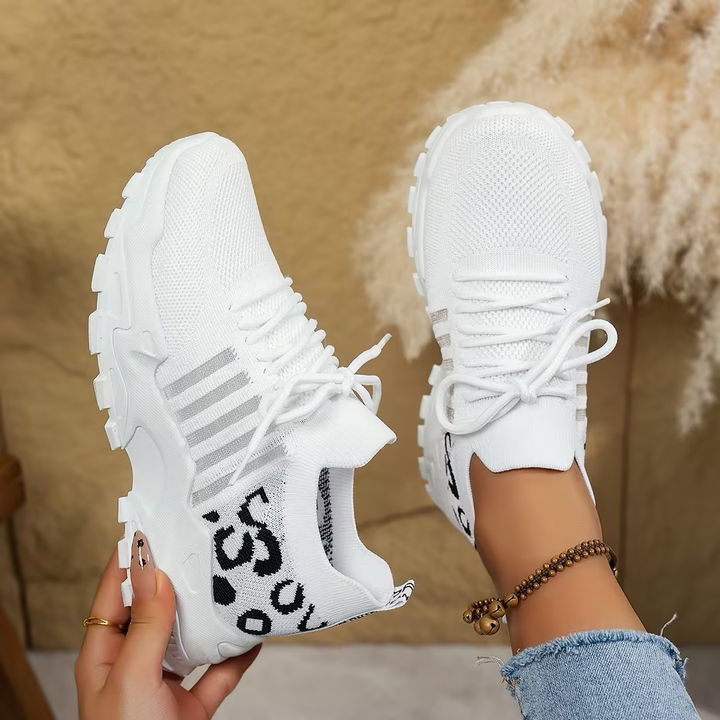 Women's comfortable lace-up orthopedic sneakers, ideal for walking, daily wear, and foot support.