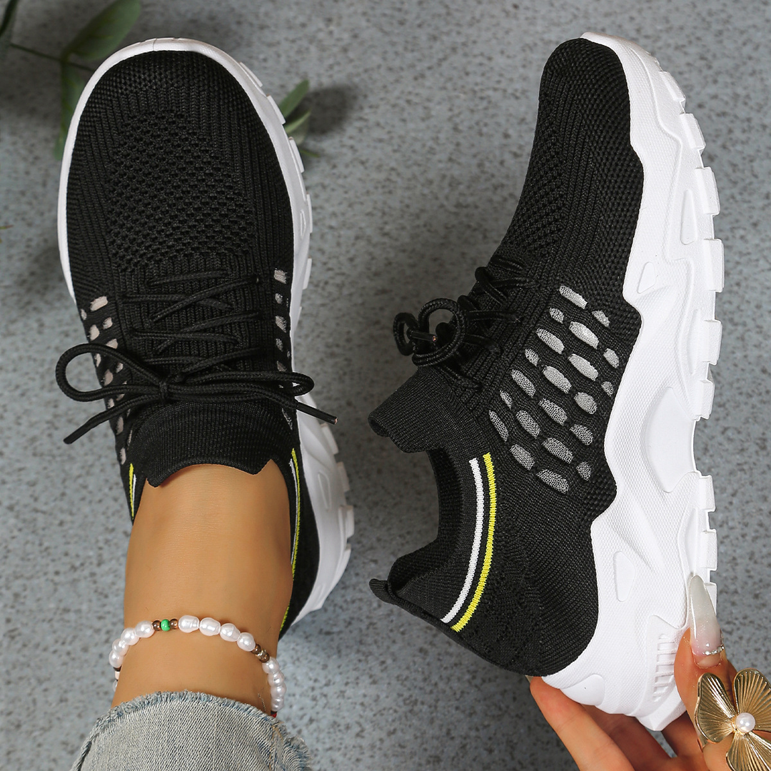 Comfortable women's orthopedic walking shoes with lace-up design for active lifestyles and foot pain relief.