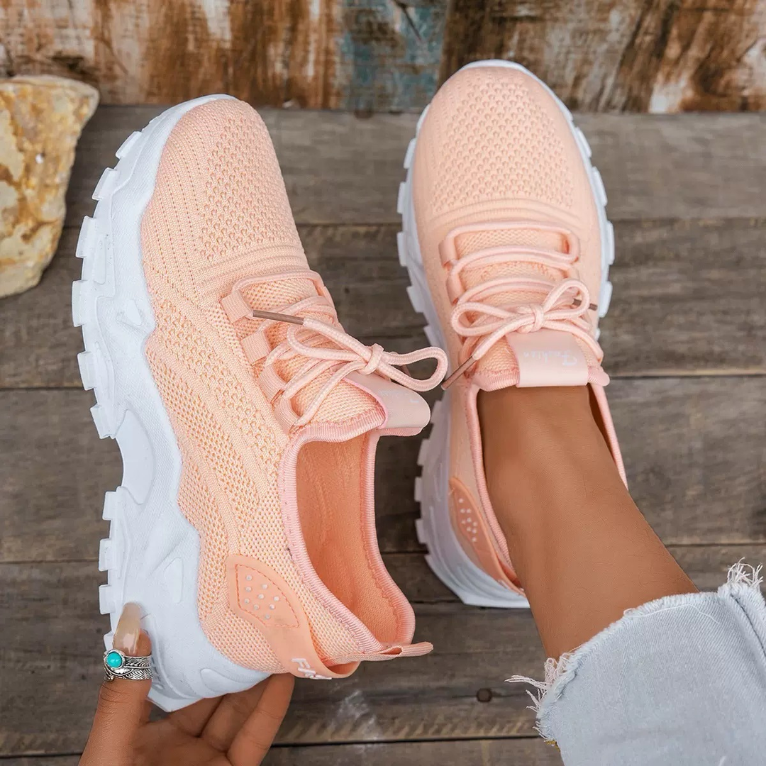 Durable women's orthopedic walking sneakers with secure lace-up closure for optimal foot comfort.