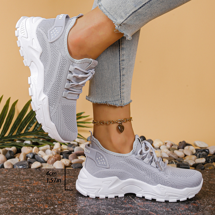 Premium women's lace-up orthopedic sneakers ensuring all-day comfort and effective foot pain relief.