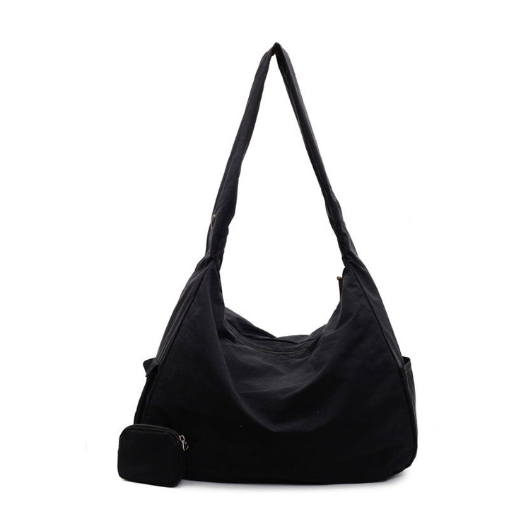 Practical women's everyday crossbody bag, large capacity for secure storage of all essentials.
