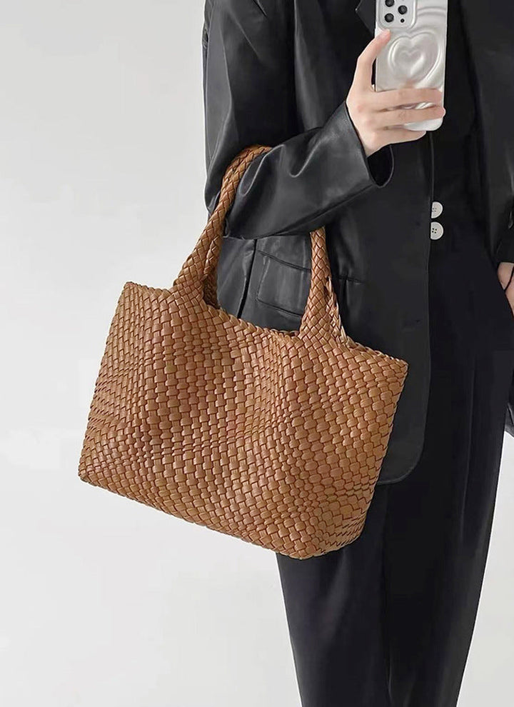Modern women's large woven tote bag, spacious & chic shoulder carry, perfect for daily fashion.