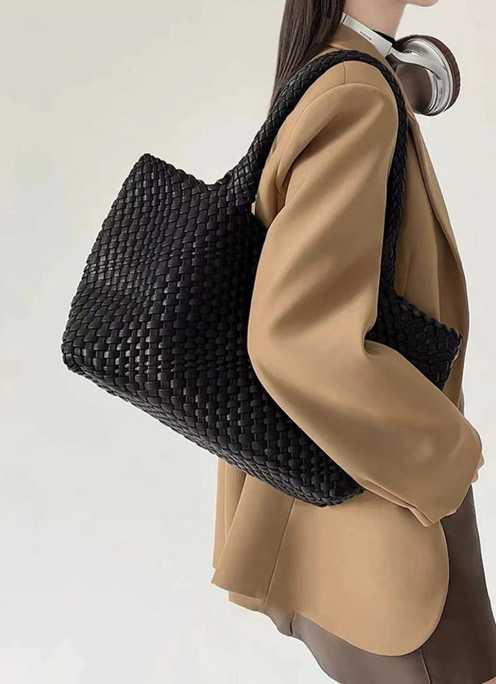 Spacious women's large woven shoulder tote bag, chic and versatile for daily errands, work, & travel.