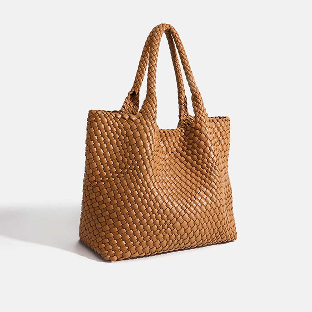 Chic women's large woven tote bag for shoulder carry, spacious and stylish for work or travel.