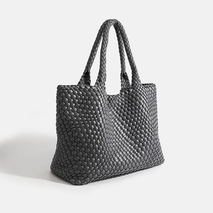 Chic women's woven large tote bag with elegant design, comfortable shoulder carry for versatility.